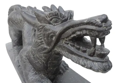 Product image of the product “Chinese Dragon, Right. 30 x 120x 50cm. Stone cast, handcrafted & coloured Right Foot Forward”